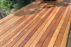 Hardwood deck with transparent stain